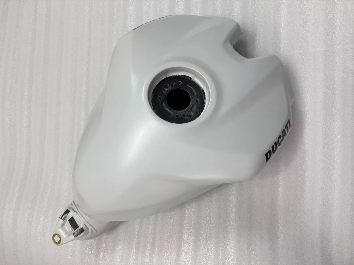White Ducati Panigale V2 tank front view showing nose contour, vent lines and upper fairing interface