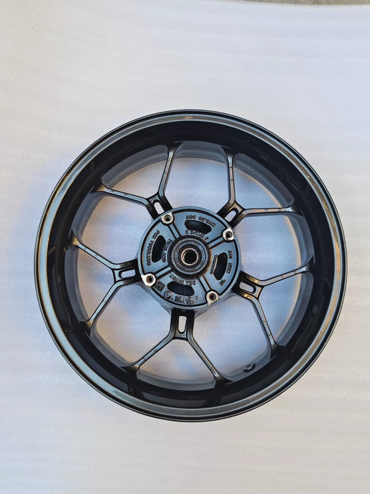 Honda CBR650R rear wheel, full side profile view showing spokes and rim
