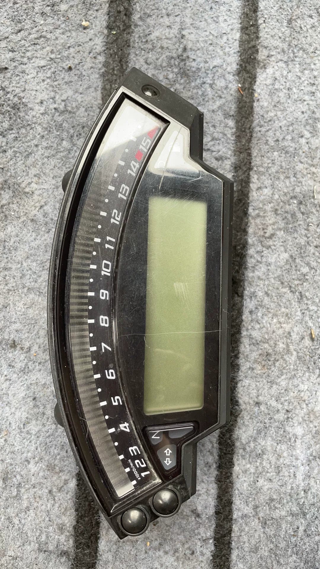 Kawasaki ZX-10R instrument cluster front view showing speedometer and tachometer gauges, good condition