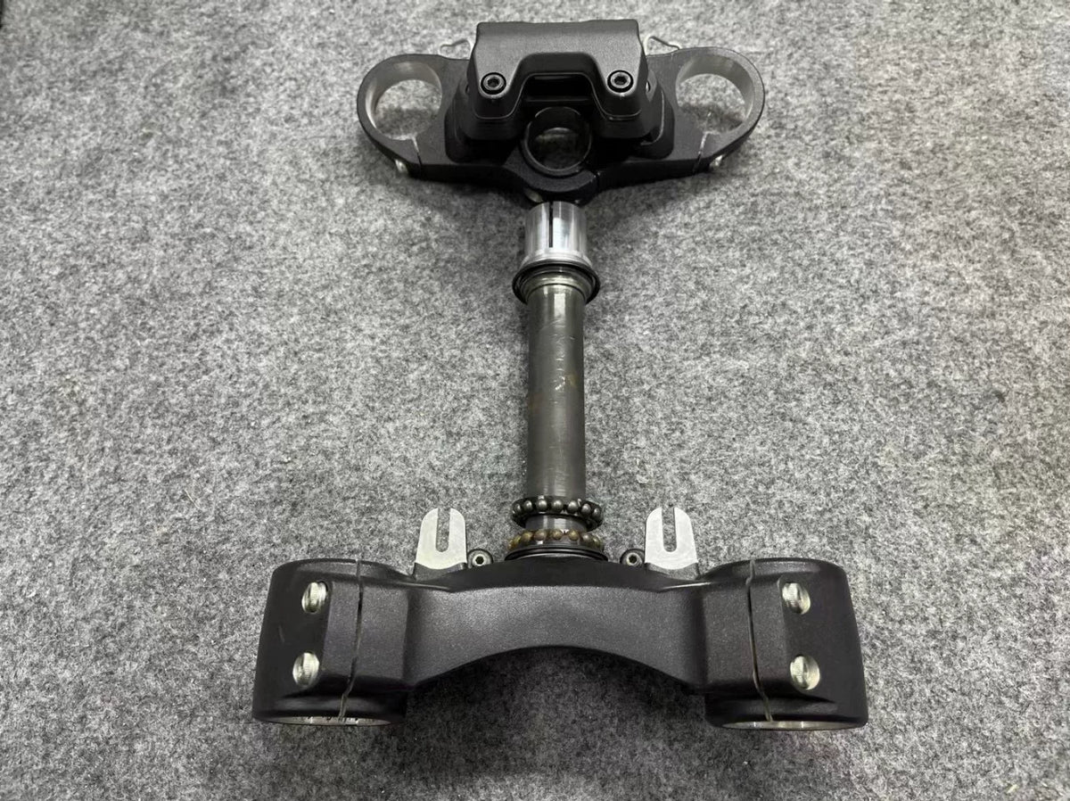 Ducati Monster 821 upper lower triple tree clamp set with handlebar bracket, front view showing complete assembly