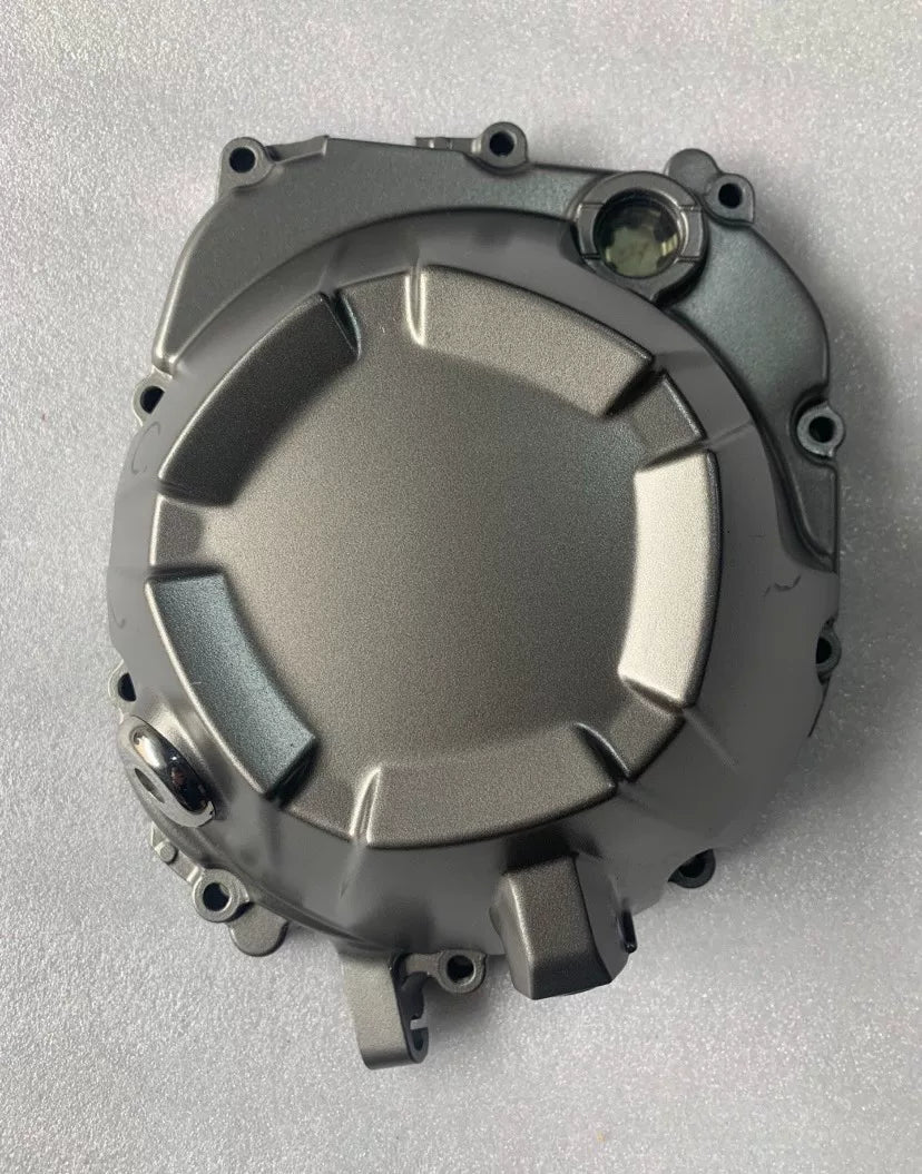 Kawasaki Z800 clutch cover OEM front view, silver aluminum finish, good refurbished condition 14032-0586
