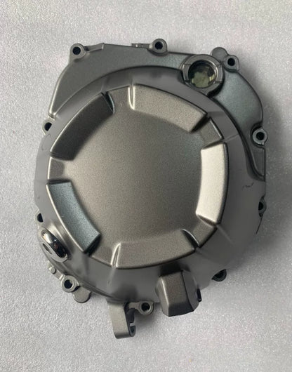 Kawasaki Z800 clutch cover OEM front view, silver aluminum finish, good refurbished condition 14032-0586