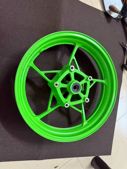 Anniversary edition green front wheel for Kawasaki ZX-4RR, front-facing view showing rim and spoke detail