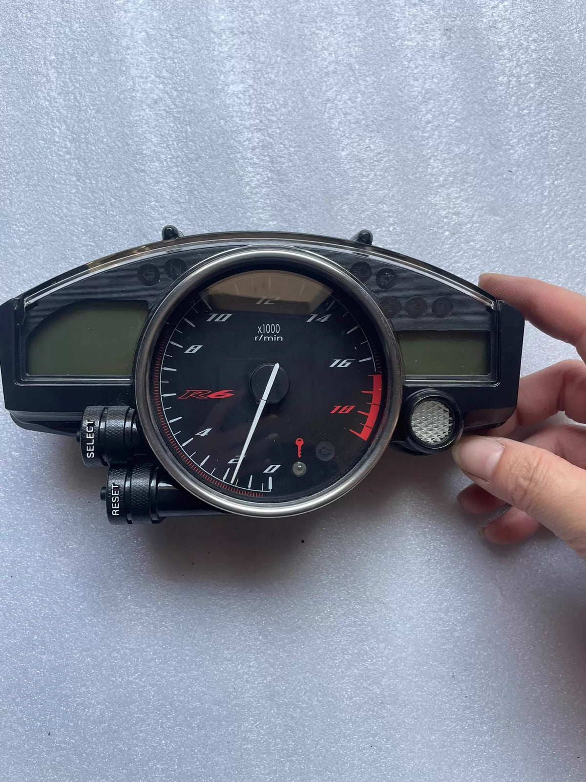 Yamaha YZF-R6 2006-2020 instrument cluster, front view showing speedometer and tachometer gauges, good condition