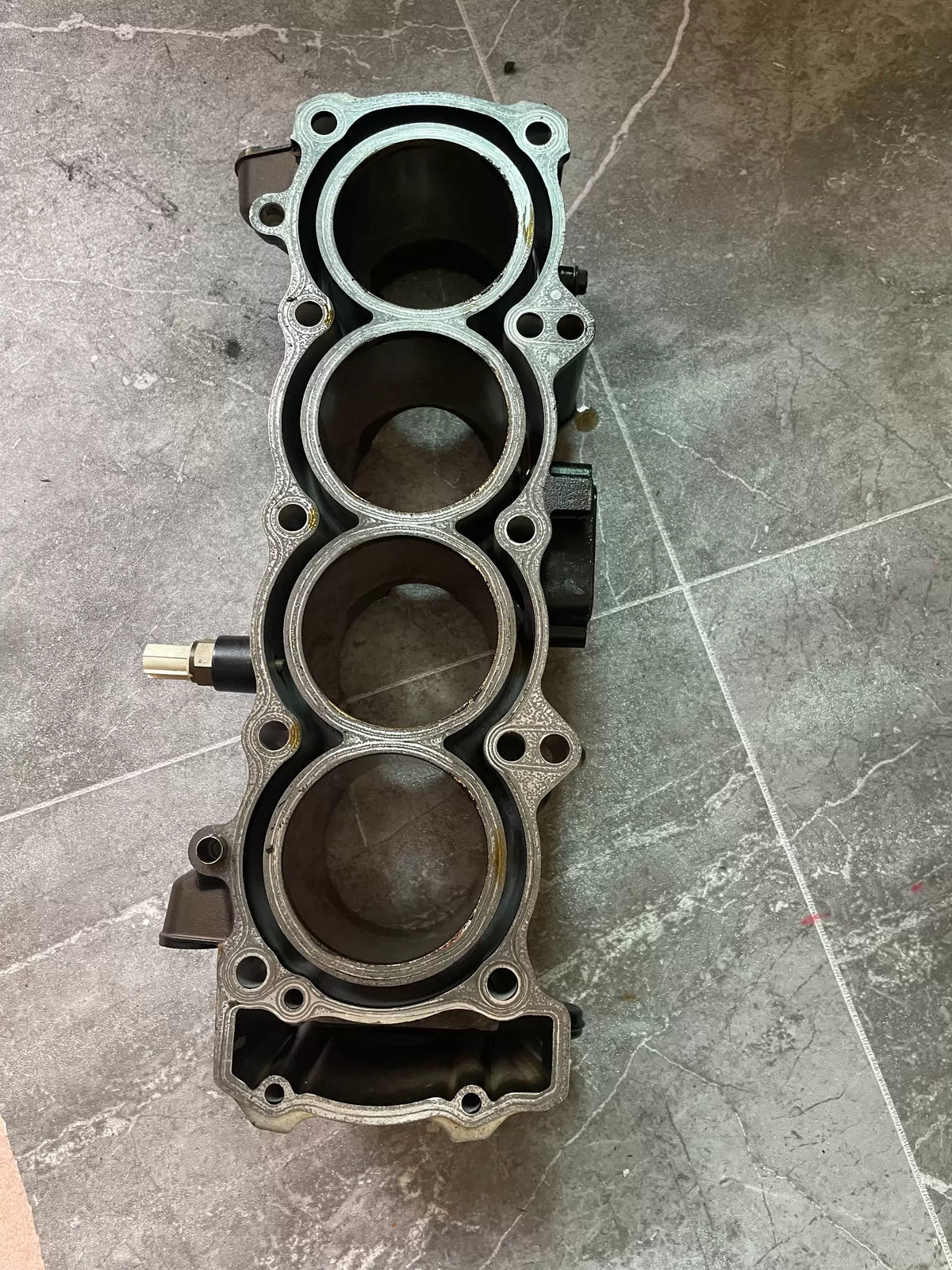 Kawasaki Z900 engine middle cylinder block, front angle view showing casting detail and cooling fins