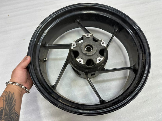 OEM Aprilia RS660 rear wheel 5.5x17 full view showing spokes and hub, clean condition