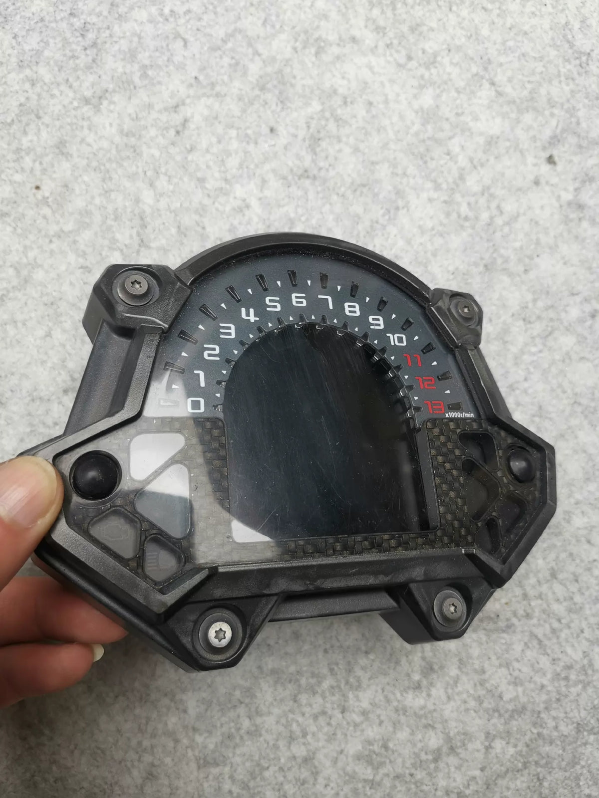 Kawasaki Z900 instrument cluster front view showing digital display and analog tachometer in good condition