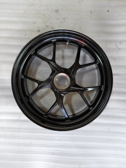 Ducati Panigale V2 rear wheel, front-facing view showing spokes and hub detail, used condition