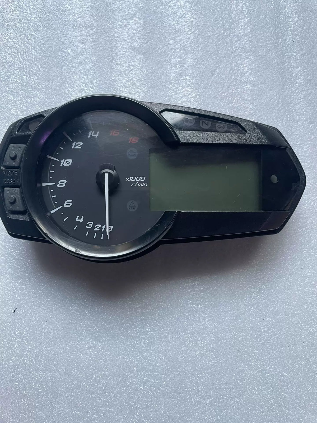 Kawasaki ZX-6R instrument cluster front view showing digital display and tachometer gauge 2009-2024