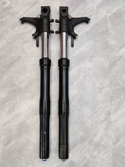 Honda CBR 600RR right fork leg shown upright, full length view, silver tube and black lower leg visible