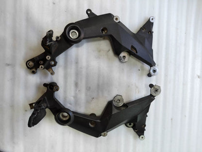 Ducati Multistrada 1200 footpeg bracket, front angle view showing mounting tabs and overall structure