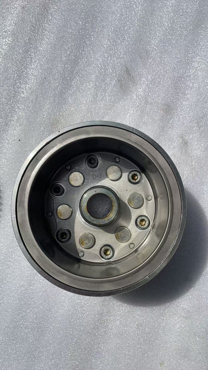 BMW G310R flywheel side profile view displaying thickness and mounting surface detail