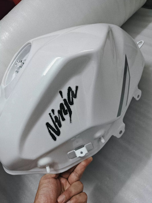 Kawasaki Ninja 400 white fuel tank comp front view showing smooth finish and mounting points