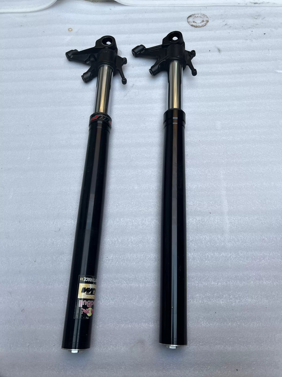 KTM 790 Duke front fork straight tube, full length front view showing smooth chrome stanchion condition