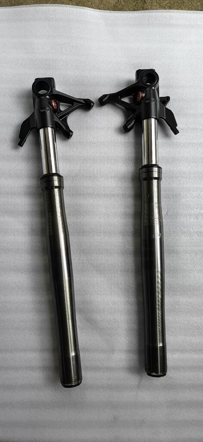 Ducati Panigale V2 front fork pair, full length front view, silver tubes with black lower legs, good condition