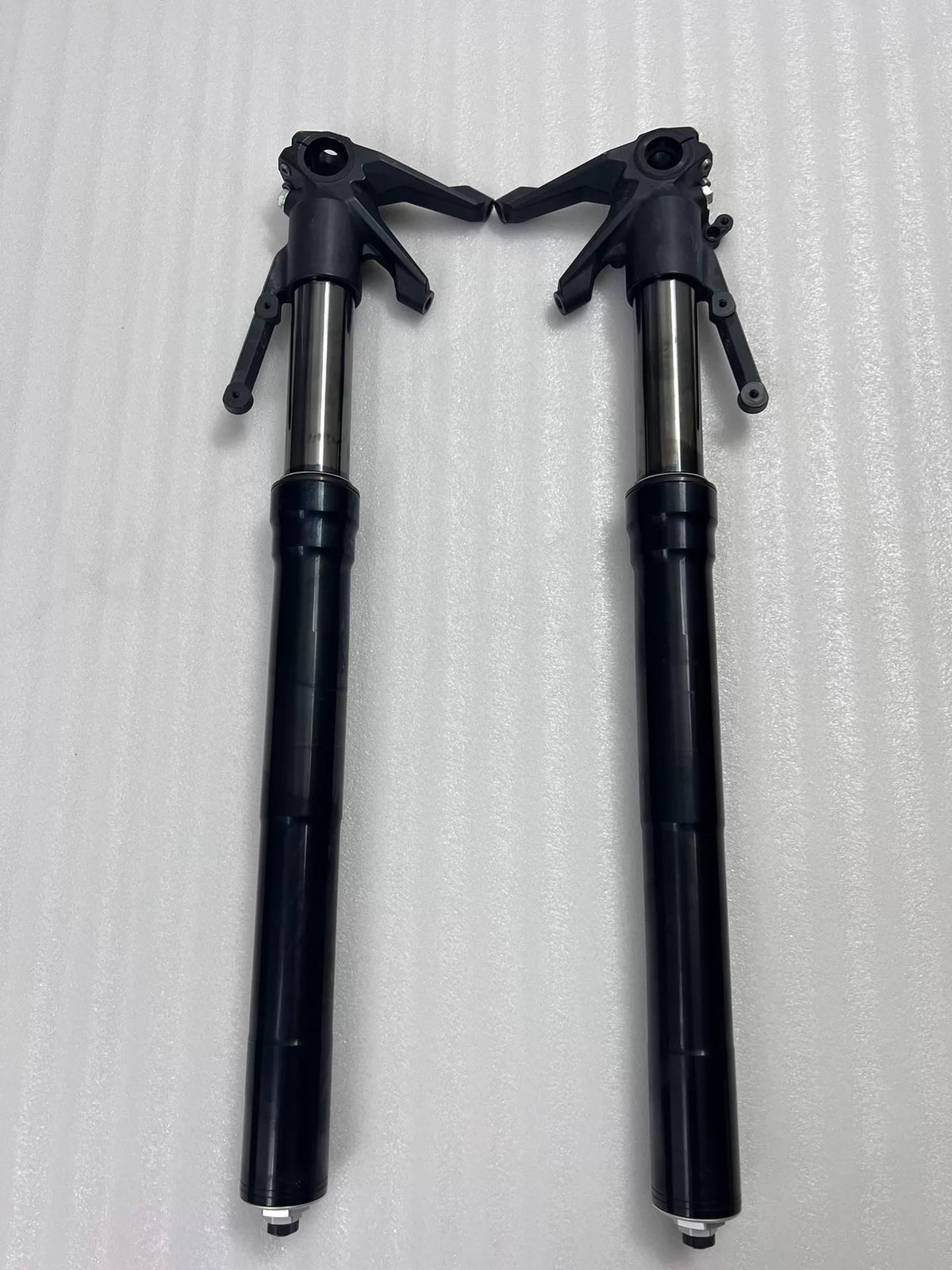 Ducati Diavel 1200 front fork assembly, full length view showing both tubes and lower legs, used condition