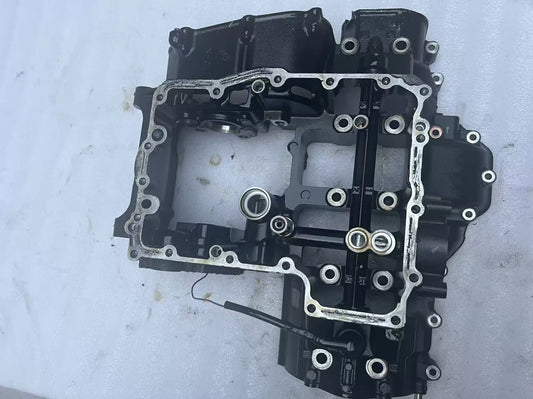 Lower crankcase for Kawasaki Z900, front three-quarter view showing casting detail and bolt holes, used condition