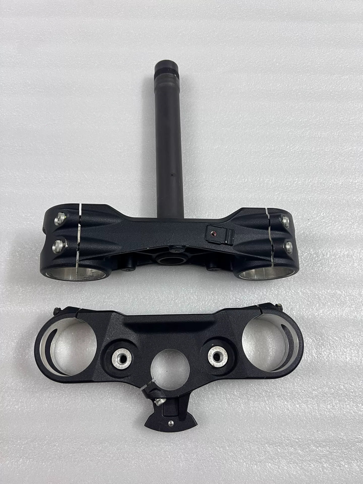 Upper fork yoke for Ducati Multistrada 1200, front view showing triple clamp and stem bore detail