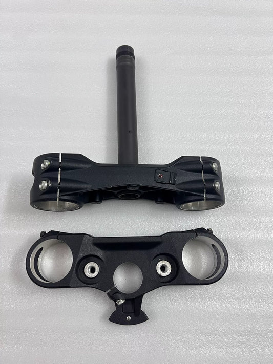 Upper fork yoke for Ducati Multistrada 1200, front view showing triple clamp and stem bore detail