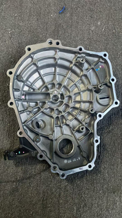 Inner view of clutch cover for Kawasaki Ninja ZX-4R, showing ribbed casting, gasket surface and bolt holes, good condition
