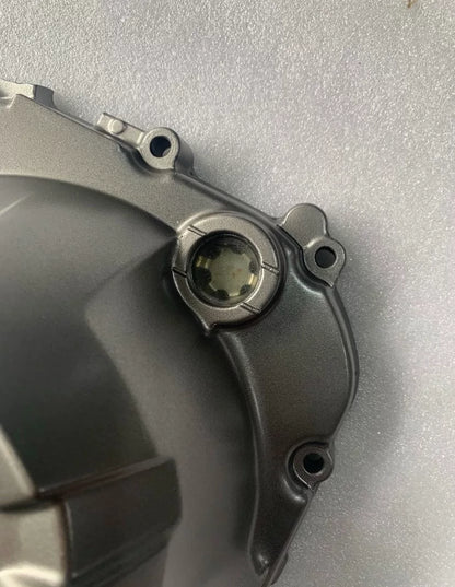 Kawasaki Z800 engine clutch cover side angle view, casting details visible, refurbished OEM 2013-2015