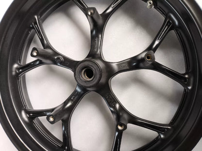 Black front wheel Honda NC750X side profile view showing spoke pattern and hub detail