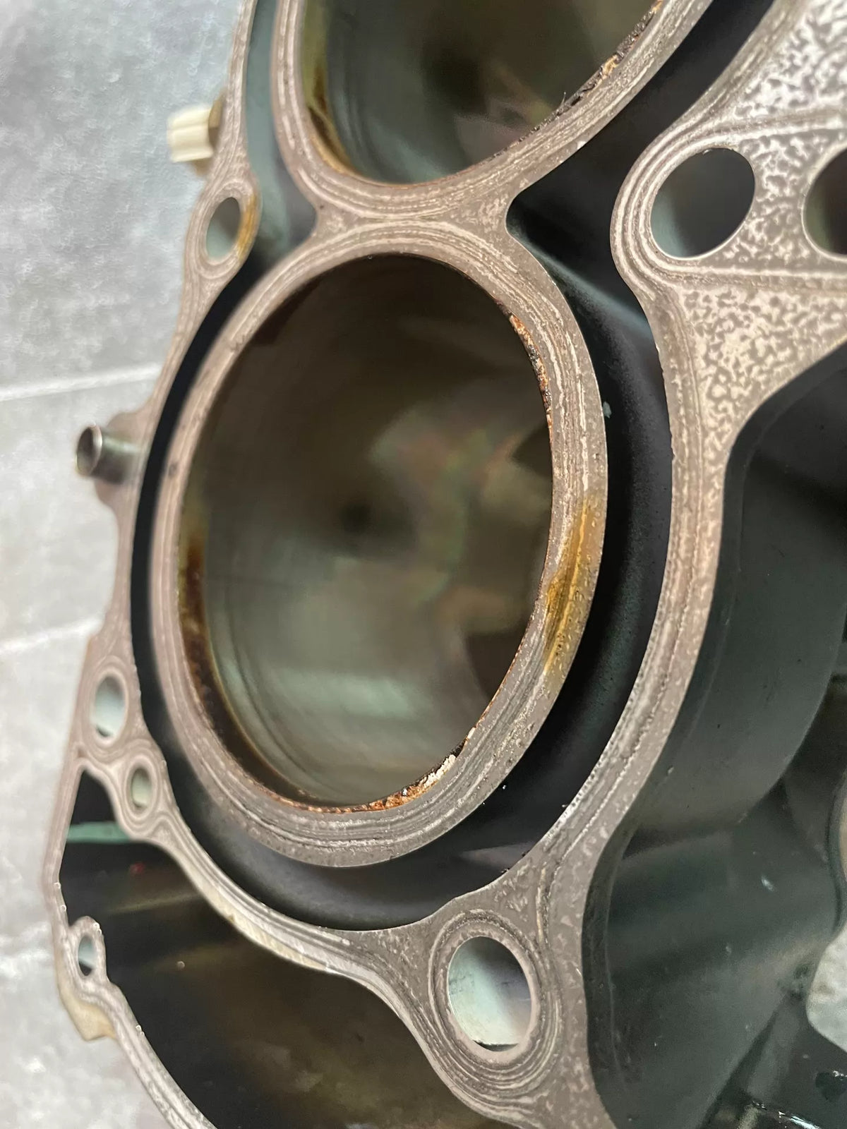 Kawasaki Z900 middle cylinder block, side profile view displaying cylinder bores and machined surfaces