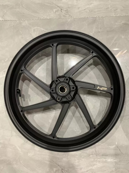 BMW S1000RR forged M HP front wheel close-up of hub center and bearing area, angled view