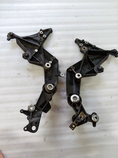 Ducati Multistrada 1200 footpeg bracket, rear angle view displaying bracket arm and pivot hardware