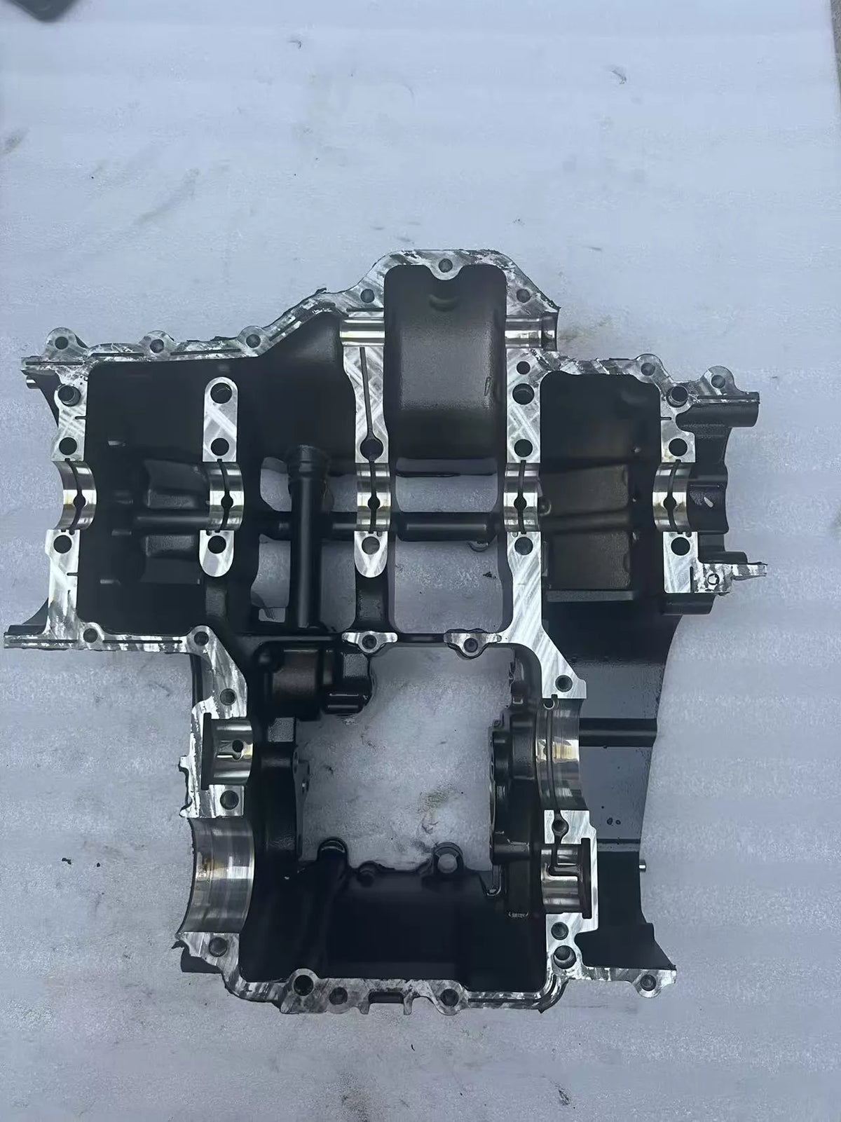 Lower crankcase Kawasaki Z900, overall top-down view showing full mating deck and bolt hole pattern, used