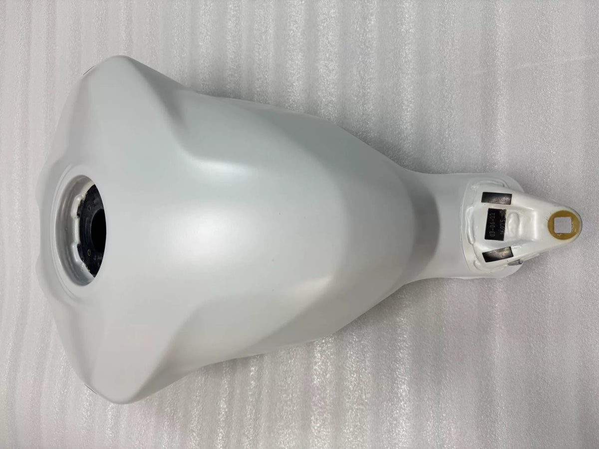 White Ducati Panigale V2 tank, rear angle revealing fuel cap recess and tail section contour