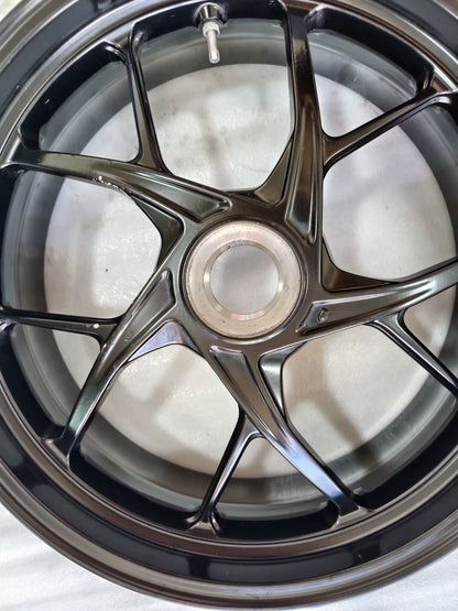 Ducati Panigale V2 rear wheel, side profile angle displaying rim and brake disc mount, used
