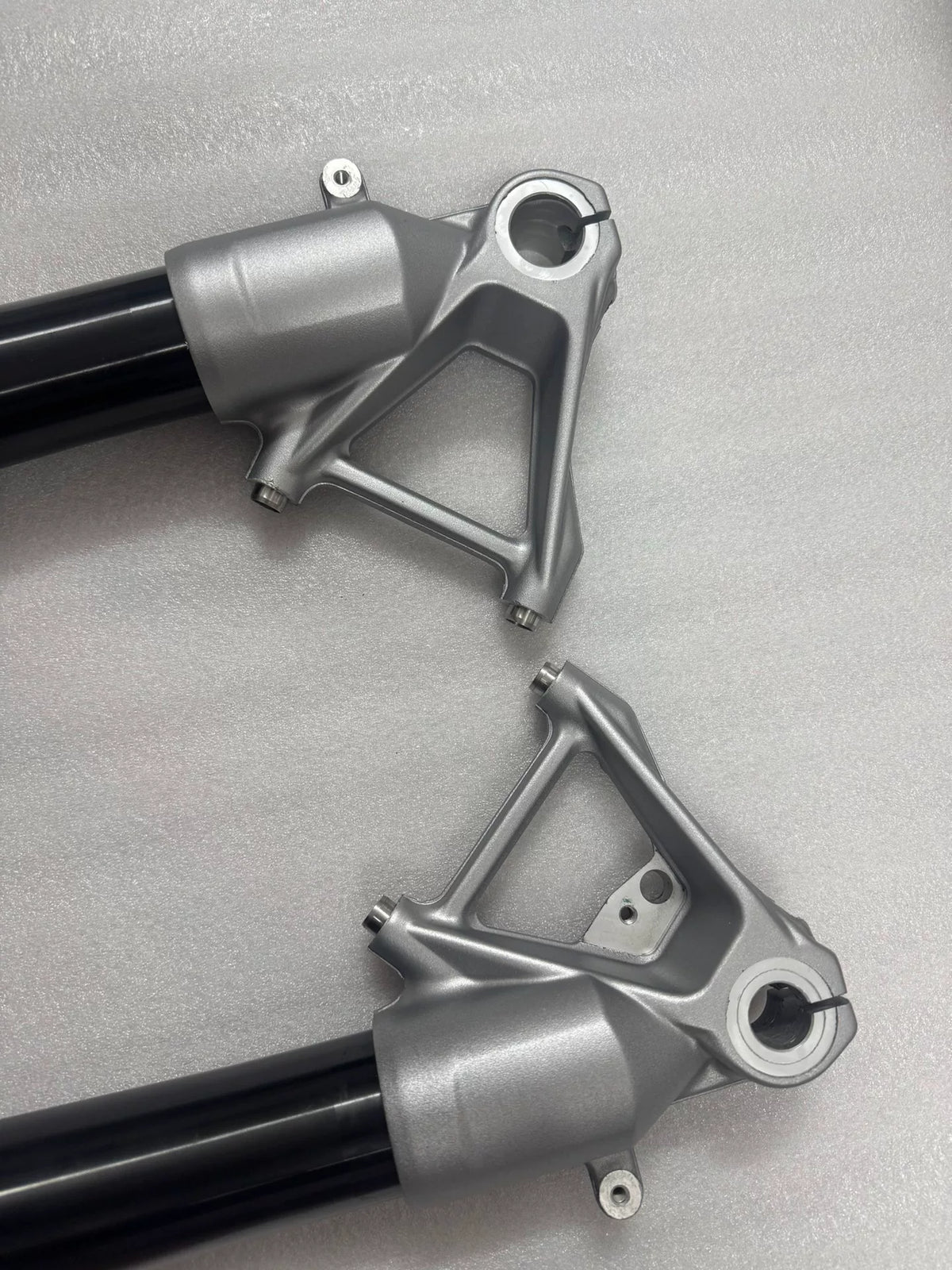 BMW R1200GS fork rod pair side profile, showing full straight tube length and chrome finish