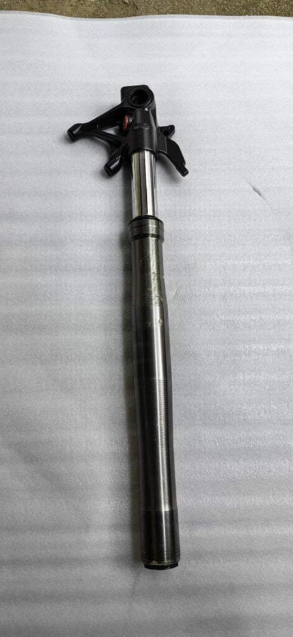 Ducati Panigale V2 front fork assembly, angled side view showing upper tubes and triple clamp area