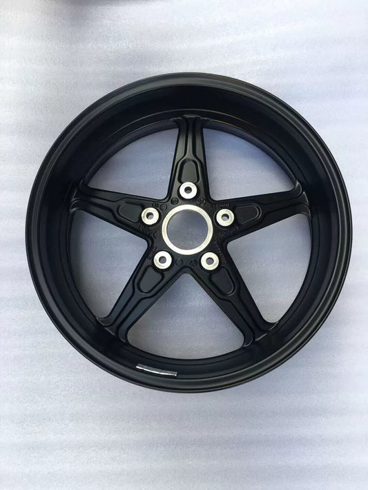 BMW R nineT rear cast rim, side profile view showing full wheel structure and spoke pattern