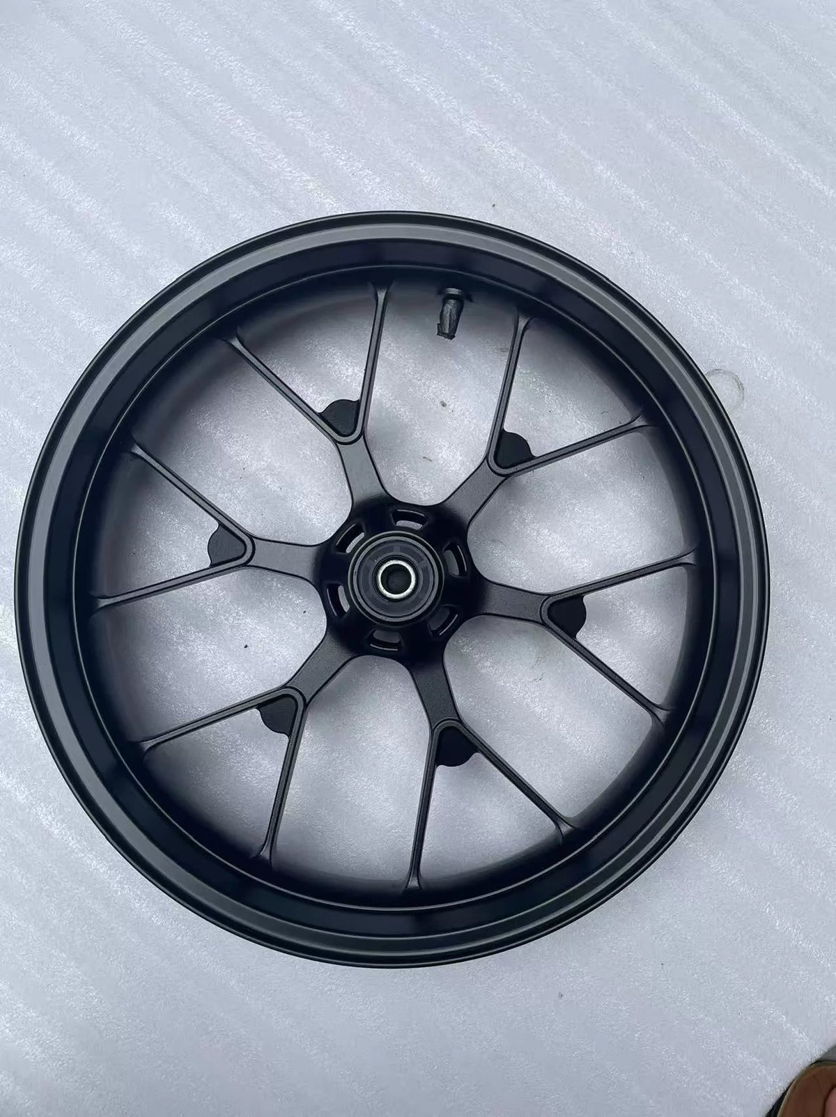 Honda CBR 500R front wheel rim straight, three-quarter view showing rim width and spoke pattern