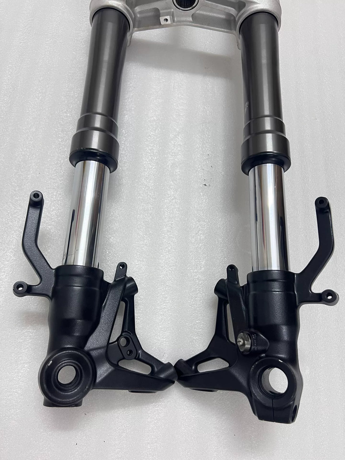 Front fork with upper lower triple clamps, Kawasaki Ninja 1000SX, rear angle overview