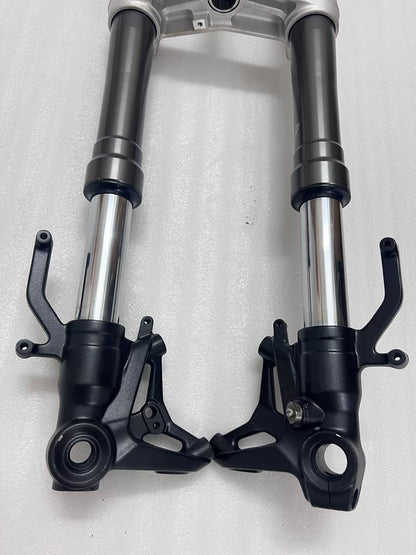 Kawasaki Ninja 1000 SX front fork close-up of upper stanchion tube and seal area, silver finish