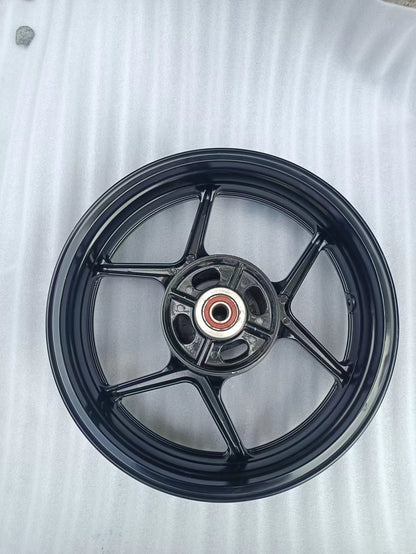 Rear wheel assembly gloss black Kawasaki Z800, side profile view displaying rim and tire mounting surface