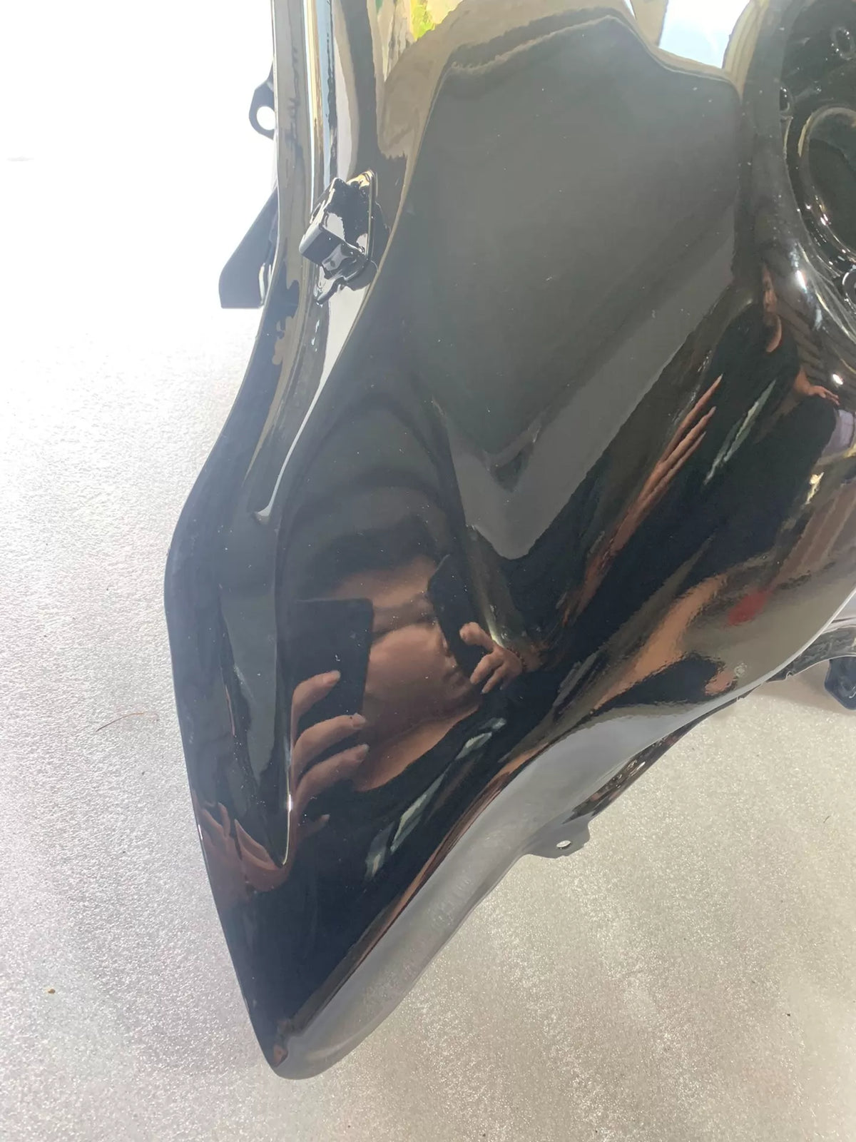 KTM 790 Duke fuel tank rear angle showing mounting tabs and underside structure, clean used condition