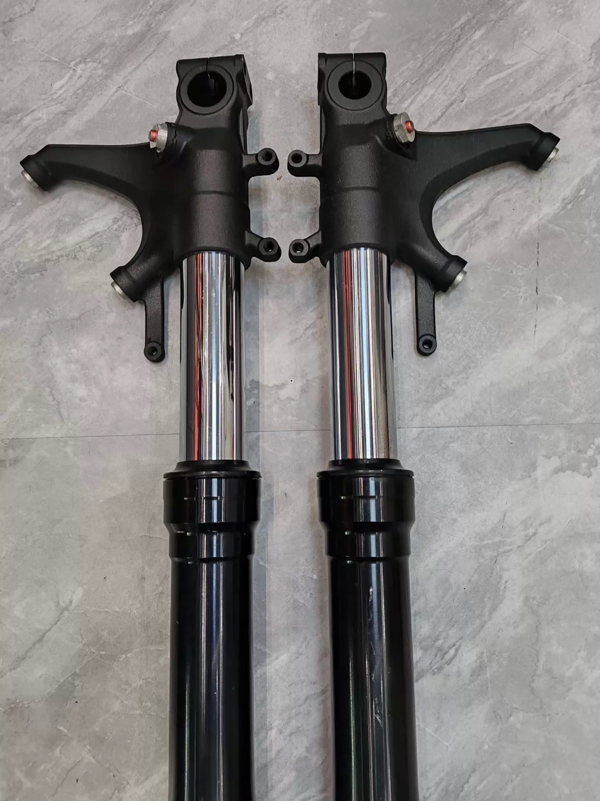 Honda CBR 600RR left fork leg upright full view, chrome upper tube with black anodized lower slider