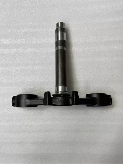 Kawasaki Z900 triple clamp side angle view revealing stem and bearing seat detail, precision CNC machined construction