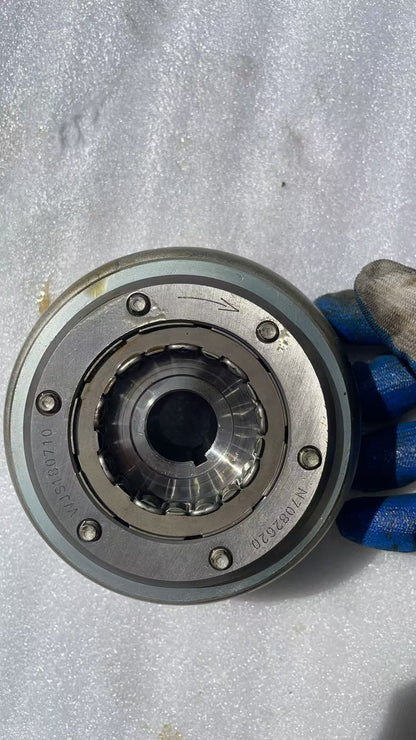 BMW G310R flywheel close-up of ring gear teeth condition around outer edge