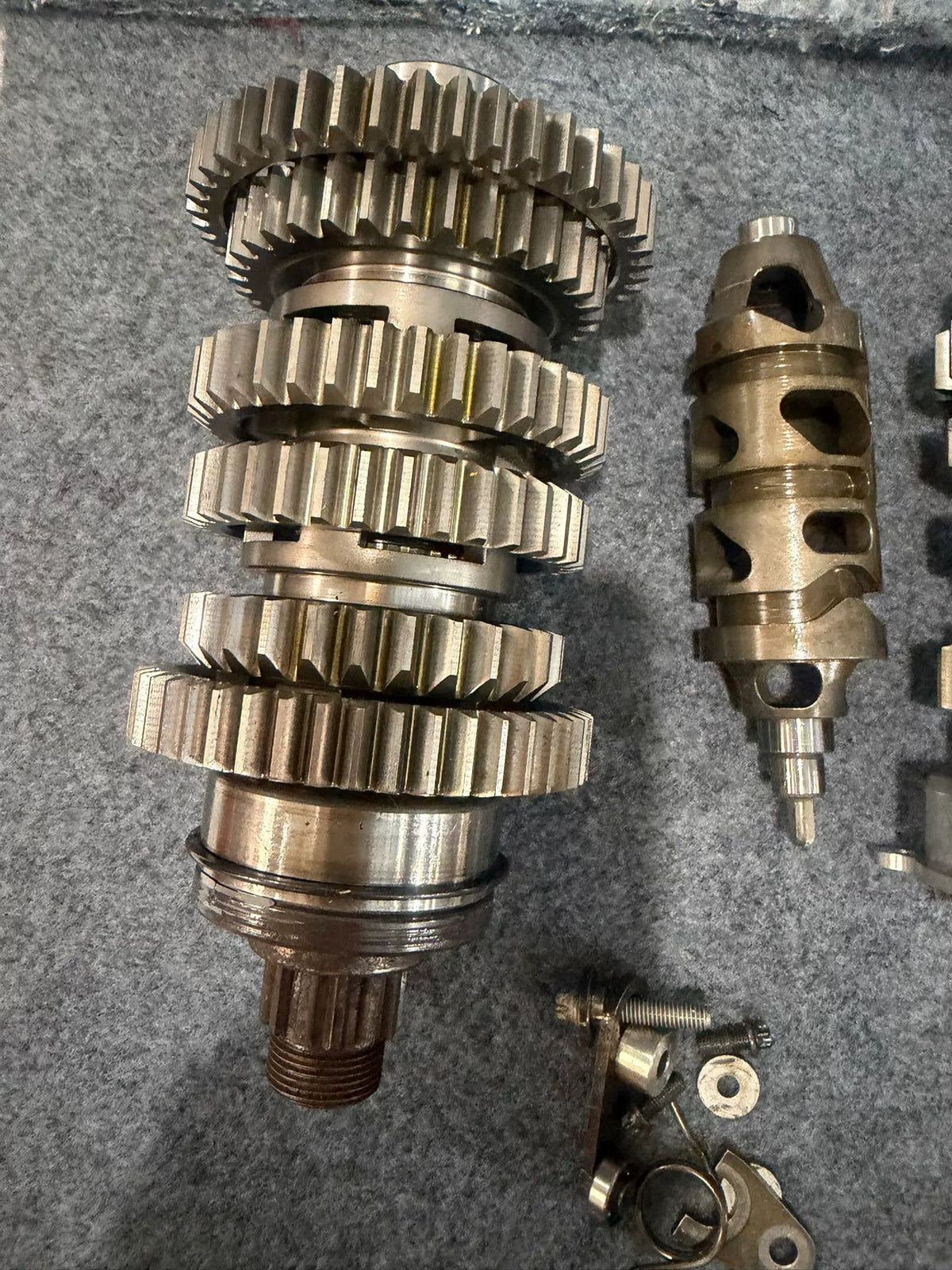 BMW S1000RR transmission rear view displaying output shaft and bearing housing