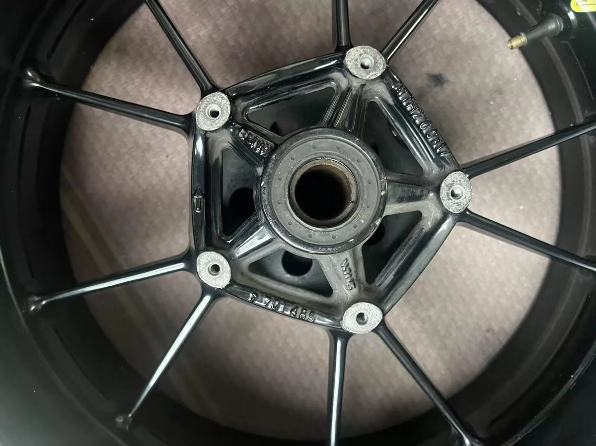 BMW S1000RR rear rim angled view showing full spoke pattern and rim edge