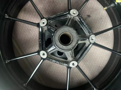 BMW S1000RR rear rim angled view showing full spoke pattern and rim edge