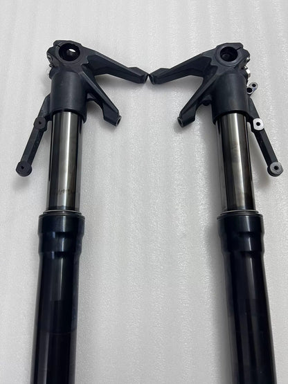Ducati Diavel 1200 front fork lower leg detail, angled view showing axle clamp and caliper mount