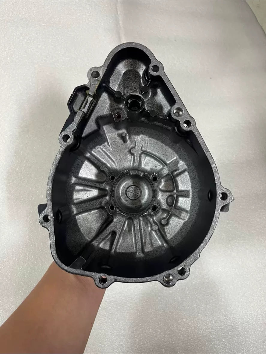 Kawasaki Z900 stator cover, close-up detail of exterior texture and machined edges