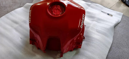 Red fuel tank for Ducati SuperSport 939, left side profile highlighting gloss red finish and trim lines