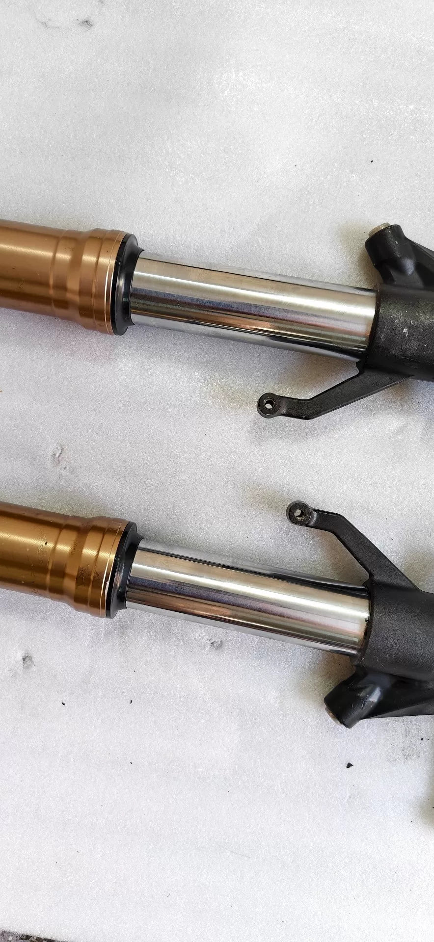 Kawasaki ZX-10R front fork stanchion chrome tube detail, mid-section showing smooth finish